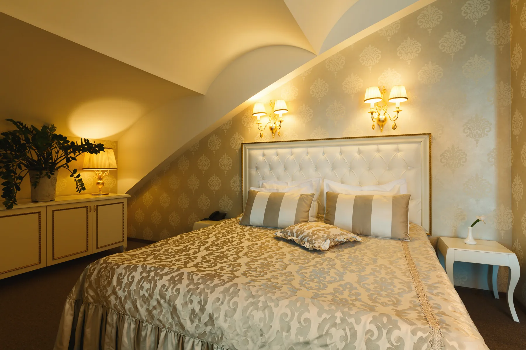 A double bedroom made up with fresh linen, ready for the next arrival